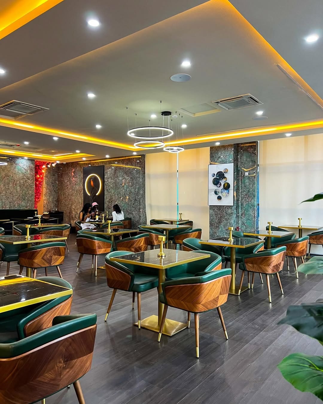 Atmospheric Restaurant Interior with Custom Booth Seating & Warm Filament Lighting #21